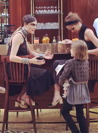  Hudson Kroenig gives Chanel dressed doll to Cara Delevingne 